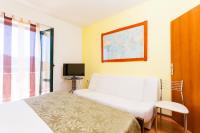 Postel nebo postele na pokoji v ubytování Apartments Marija