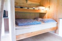 Postel nebo postele na pokoji v ubytování Asaa Camping & Cottages