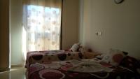 A bed or beds in a room at Hostal Huespedes Toledo
