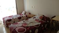 A bed or beds in a room at Hostal Huespedes Toledo