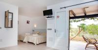 Posteľ alebo postele v izbe v ubytovaní Bungalows Sa Sargantana