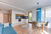 Kuchnia lub aneks kuchenny w obiekcie Gdansk Comfort Apartments Bursztynowa