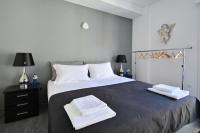 Postel nebo postele na pokoji v ubytování Plaka Elegant Apartment