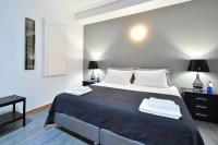Postel nebo postele na pokoji v ubytování Plaka Elegant Apartment