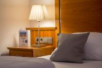 Postel nebo postele na pokoji v ubytování Landidyll Hotel zum Freden