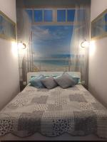 Posteľ alebo postele v izbe v ubytovaní Apartamenty Blisko Plaży Podczele