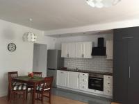 Kuchyňa alebo kuchynka v ubytovaní Apartamenty Blisko Plaży Podczele