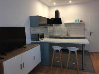 Kuchyňa alebo kuchynka v ubytovaní Apartamenty Blisko Plaży Podczele