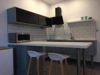 Kuchyňa alebo kuchynka v ubytovaní Apartamenty Blisko Plaży Podczele