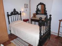 A bed or beds in a room at Cal Son