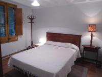 A bed or beds in a room at Cal Son