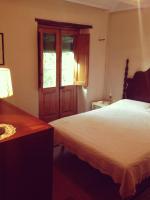 A bed or beds in a room at Cal Son