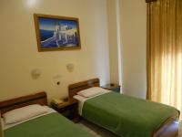 Posteľ alebo postele v izbe v ubytovaní Hotel Admitos