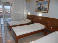 Posteľ alebo postele v izbe v ubytovaní Hotel Admitos