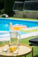 The swimming pool at or close to Villa Oliva Boutique Rooms Zamárdi