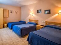 Postel nebo postele na pokoji v ubytování Hotel Legazpi
