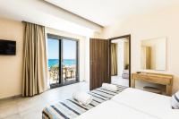 Posteľ alebo postele v izbe v ubytovaní Theo Star Beach Hotel