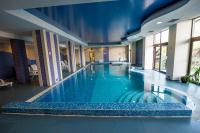 The swimming pool at or close to Rhodopi Home Hotel Chepelare - Half Board & All inclusive