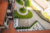 A garden outside Rhodopi Home Hotel Chepelare - Half Board & All inclusive