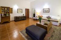 A seating area at At Kalsa Quiet Flowered Terrace! Free Parking! Ideal for remote working!
