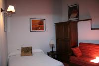 Cama o camas de una habitación en Apartamentos Rurales Víctor Chamorro del Arco