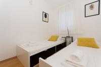 Postel nebo postele na pokoji v ubytování Apartment Flynn
