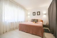 Posteľ alebo postele v izbe v ubytovaní Mateja Apartment
