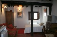 Cama o camas de una habitación en Apartamentos Rurales Víctor Chamorro del Arco