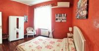 A bed or beds in a room at CiaoRoma!