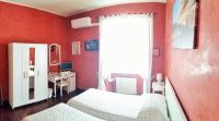 A bed or beds in a room at CiaoRoma!