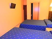 Posteľ alebo postele v izbe v ubytovaní Hostal Bonavista