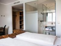 Posteľ alebo postele v izbe v ubytovaní Rocket Rooms Velden