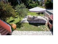 Vonkajšia záhrada v ubytovaní Villa Palmyra