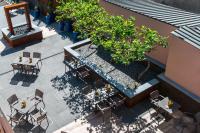 an overhead view of a patio with tables and chairs at Le Florentin in Florenville