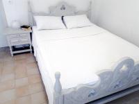 A bed or beds in a room at Thera Incognita Studios