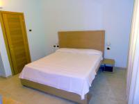 Cama o camas de una habitación en Hotel Villa Carolina