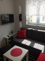 TV a/nebo společenská místnost v ubytování Apartments Ema