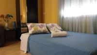 Posteľ alebo postele v izbe v ubytovaní Apartamento Domingo Lozano