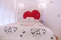 Posteľ alebo postele v izbe v ubytovaní Apartamentos Momas La Casa De Mamá