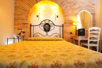 A bed or beds in a room at Hotel La Bitta - Bovis Hotels