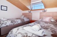 Postel nebo postele na pokoji v ubytování Villa Vanilla with Heated Pool