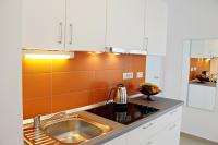 Kuchyň nebo kuchyňský kout v ubytování Apartments Lopari