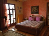 A bed or beds in a room at Villa Voirani