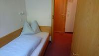 Postel nebo postele na pokoji v ubytování Appartementhotel Hechenberg