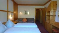 Postel nebo postele na pokoji v ubytování Appartementhotel Hechenberg