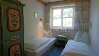 Postel nebo postele na pokoji v ubytování Appartementhotel Hechenberg