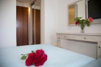 Postel nebo postele na pokoji v ubytování Zeus Hotel