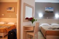Postel nebo postele na pokoji v ubytování Zeus Hotel