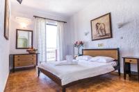 Postel nebo postele na pokoji v ubytování Creta Aquamarine Hotel