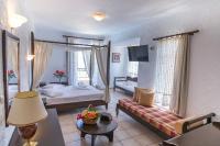 Postel nebo postele na pokoji v ubytování Creta Aquamarine Hotel